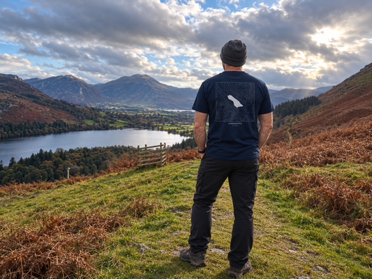Person wearing the Loweswater contour T-shirt overlooking Loweswater in the Lake District
